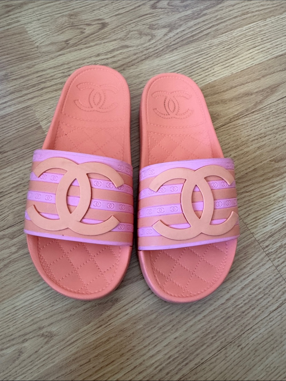 CHANEL Coral and Light Pink Interlocking CC Slide Sandals